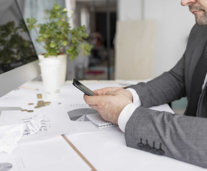man-checking-his-phone-job